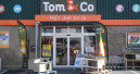 Delhaize verkauft Tom & Co.